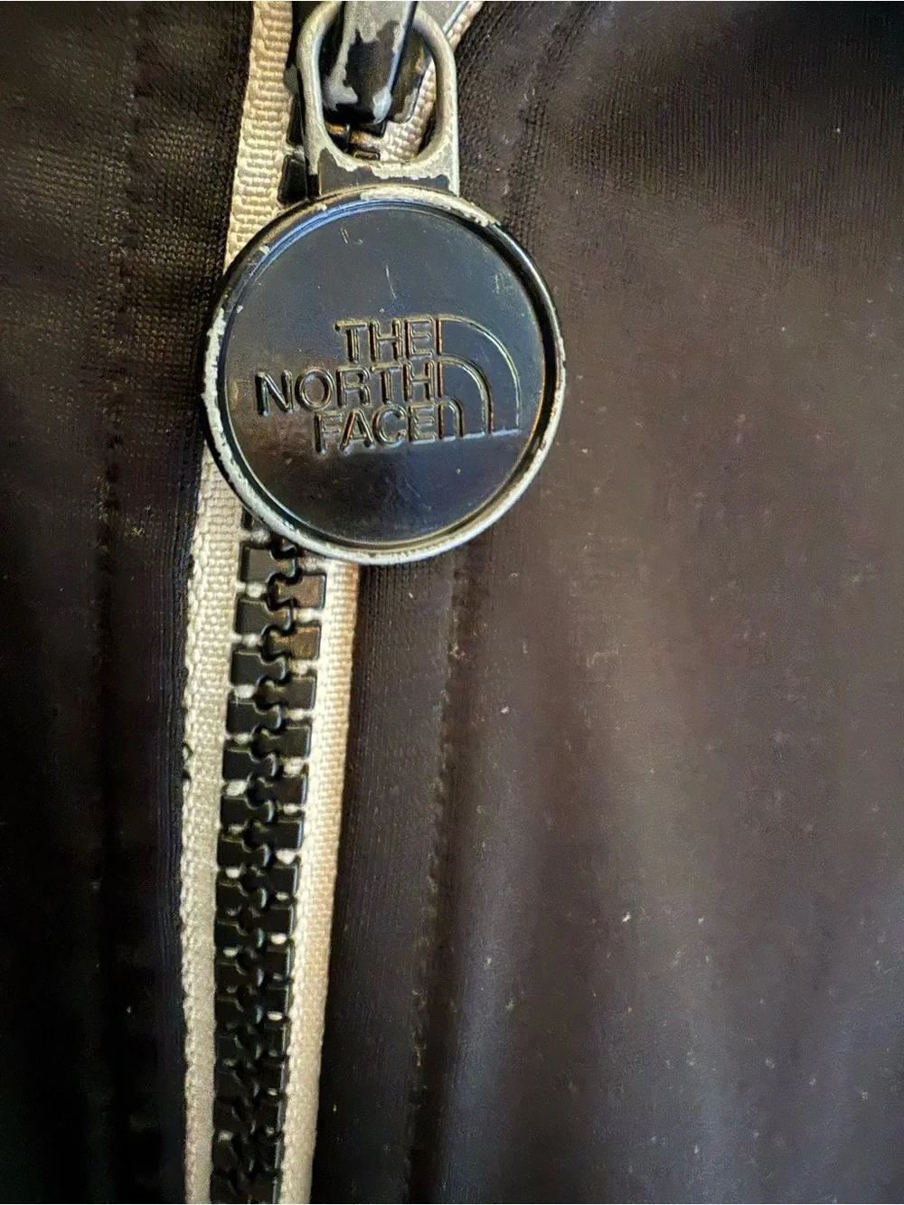 The North Face Black Jacket with Red Logo Patch